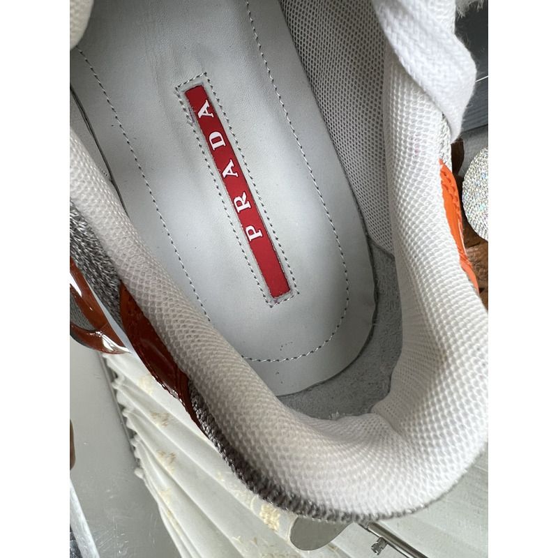 Pra*a america’s cup sneakers orange