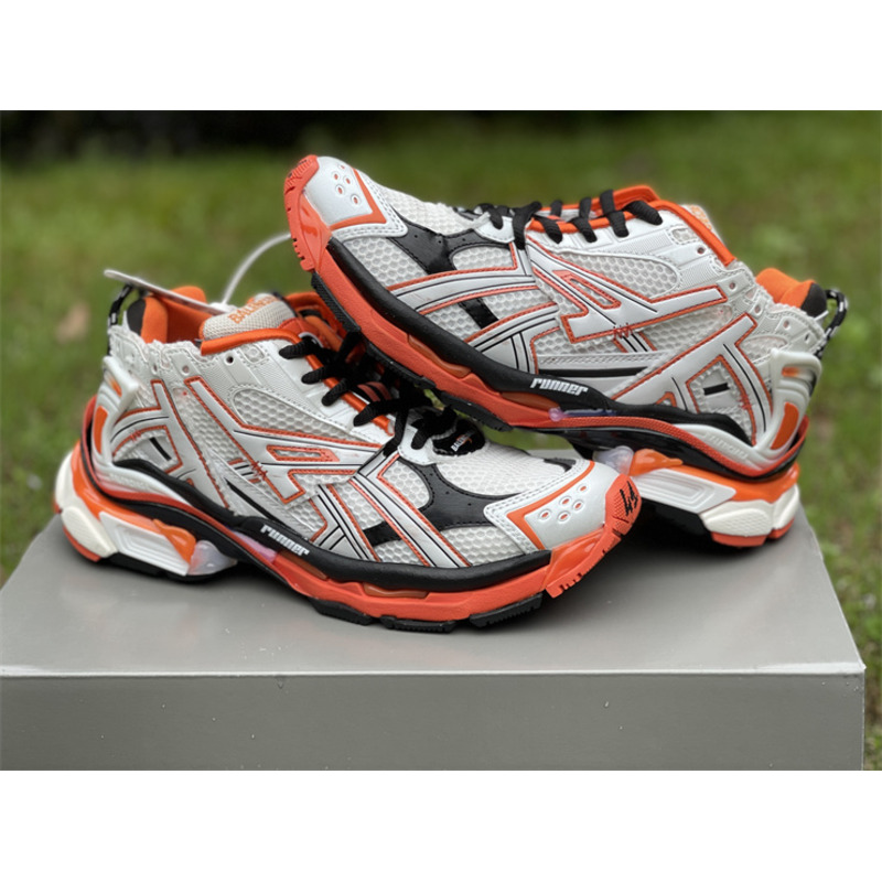kith x Ba*len*cia*ga runner sneaker white/orange/black