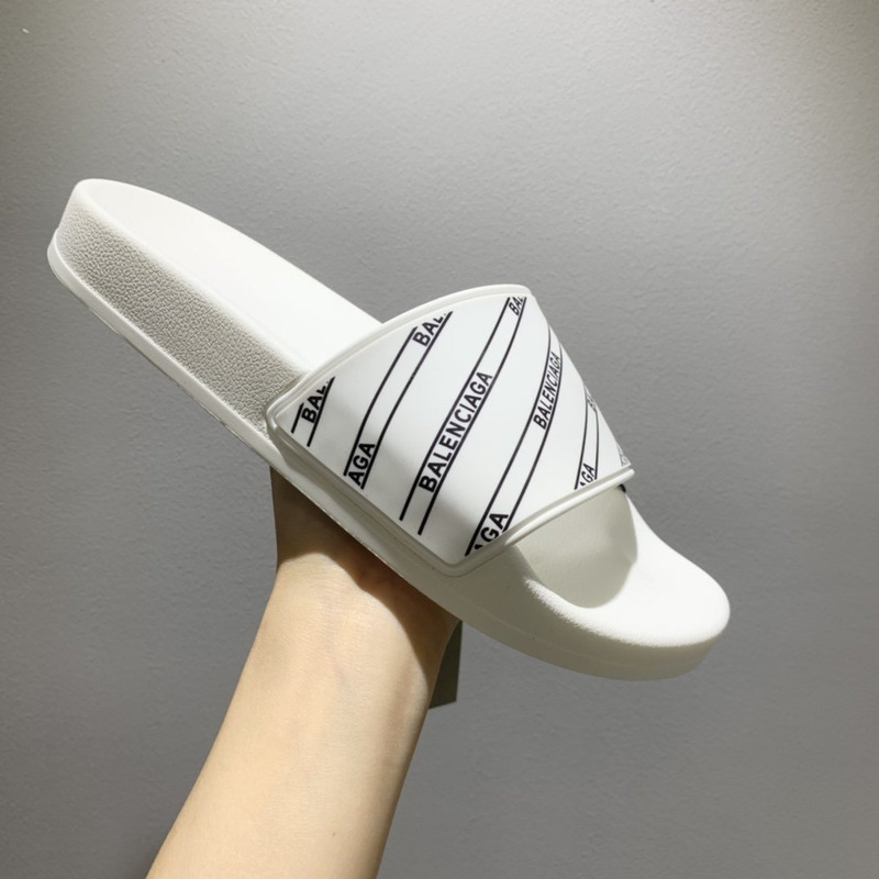 Ba*len*cia*ga logo pool slides in grain rubber