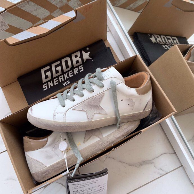 golden goose men’s S*per-star sneakers with suede star and brown heel tab