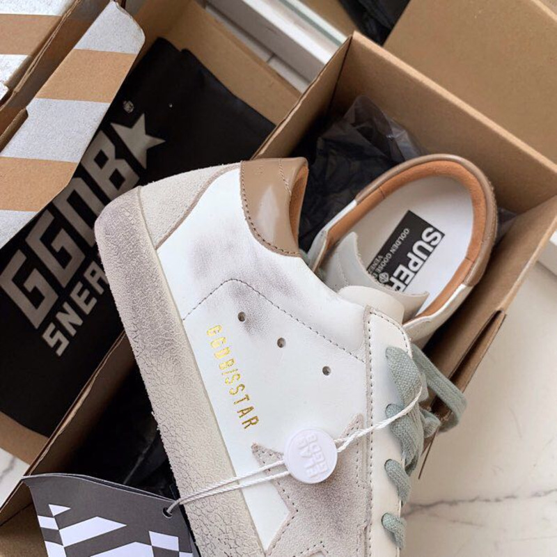 golden goose men’s S*per-star sneakers with suede star and brown heel tab
