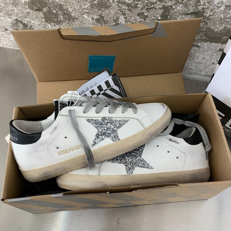 golden goose S*per-star sneakers with sliver glitter and black heel tab