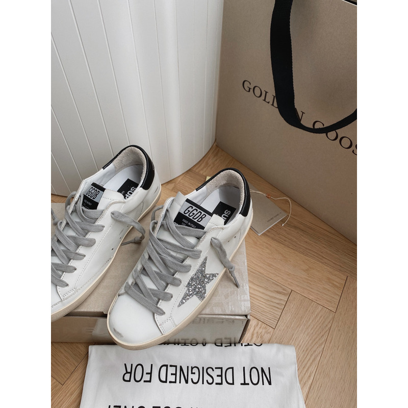 golden goose S*per-star sneakers with sliver glitter and black heel tab