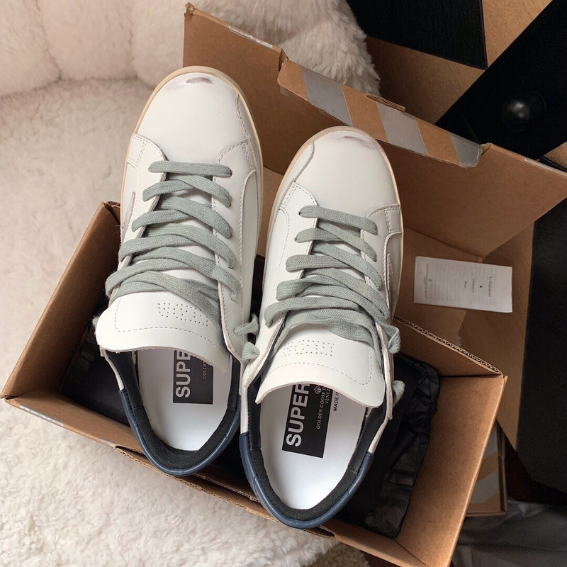 golden goose men’s S*per-star sneakers with suede star and blue heel tab
