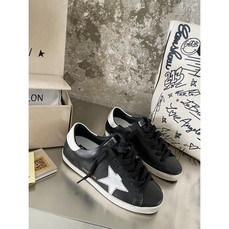 golden goose black S*per-star sneakers in leather with white star