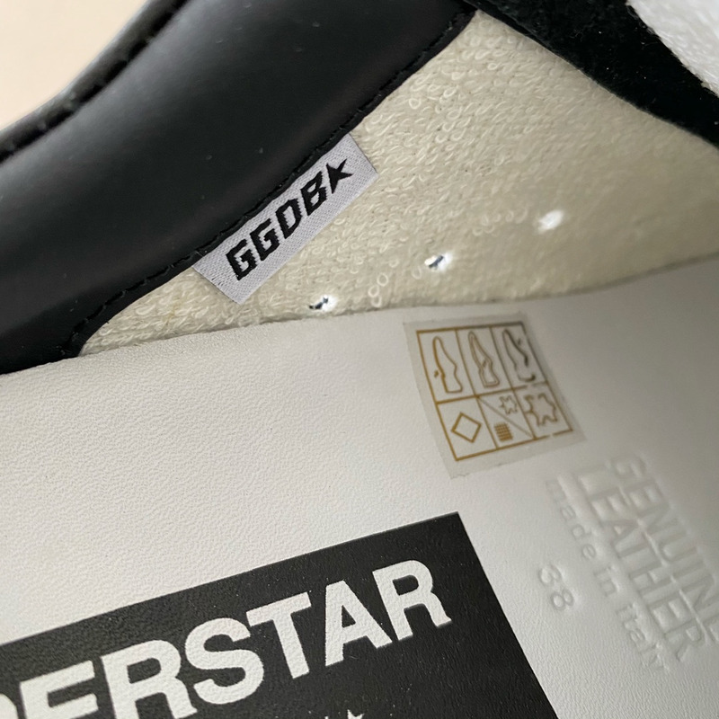 golden goose black S*per-star sneakers in leather with white star