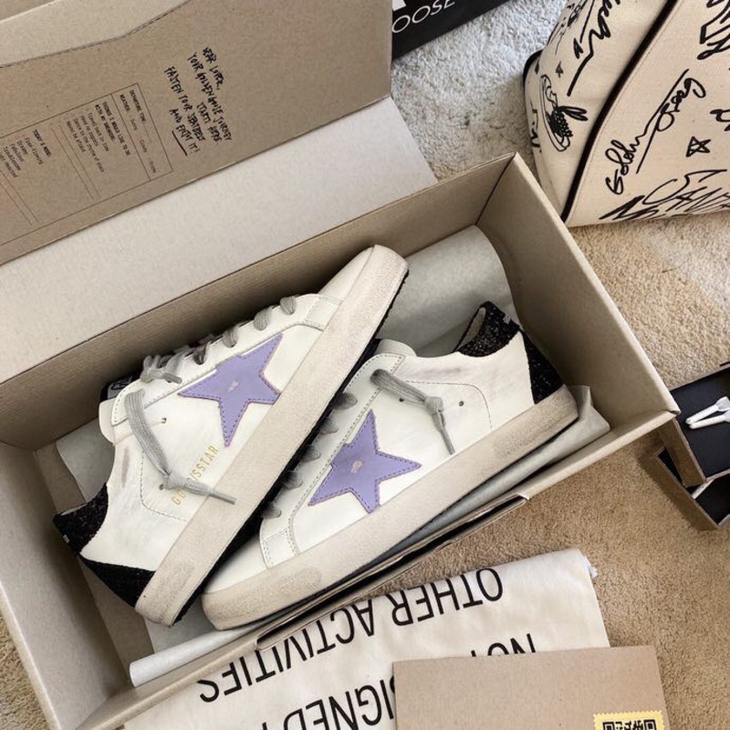 golden goose S*per-star sneakers with purple star logo and black heel tab