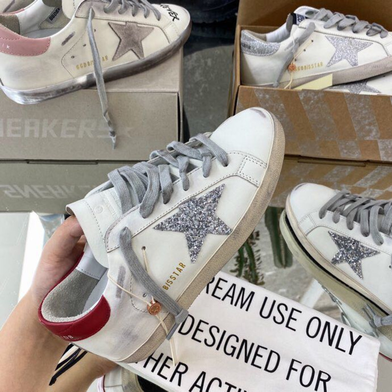 golden goose S*per-star sneakers with sliver glitter and red heel tab