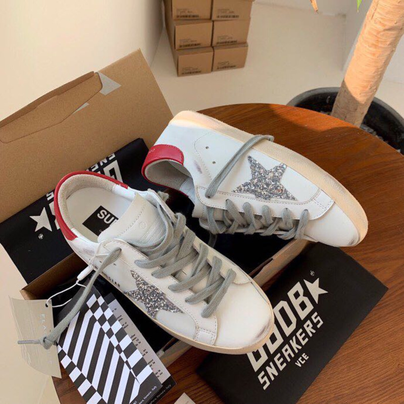 golden goose S*per-star sneakers with sliver glitter and red heel tab