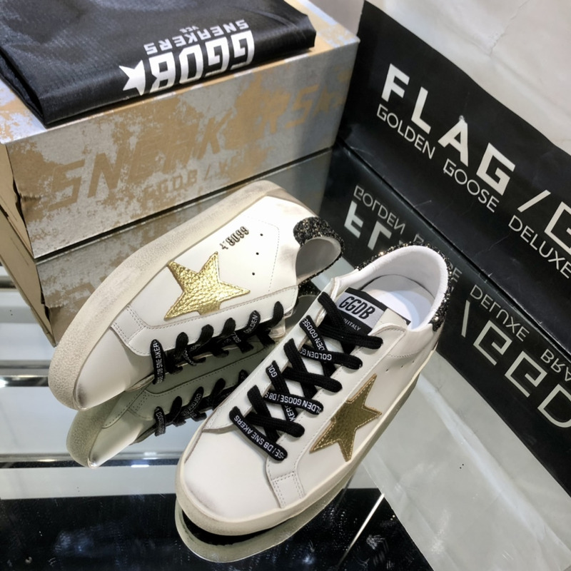 golden goose S*per-star sneakers with glitter and black heel tab