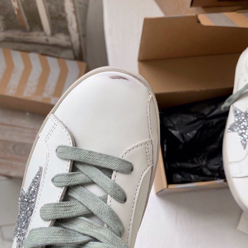 golden goose S*per-star sneakers with sliver glitter and black heel tab