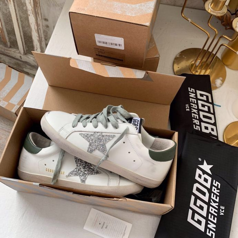 golden goose S*per-star sneakers with sliver glitter and black heel tab