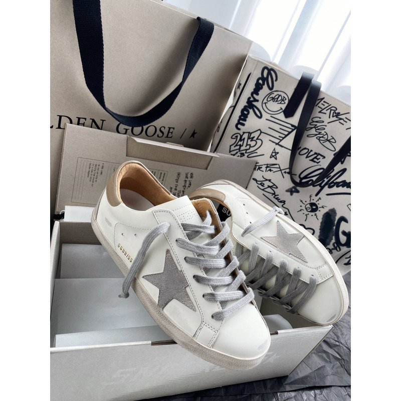 golden goose men’s S*per-star sneakers with suede star and camel heel tab