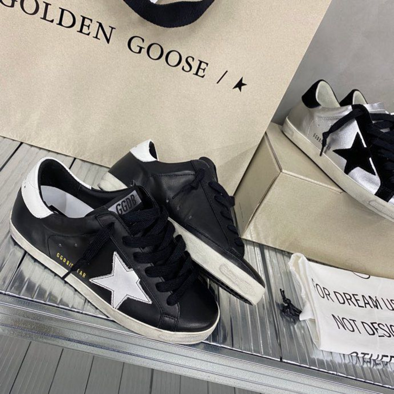 golden goose black S*per-star sneakers in leather with white star