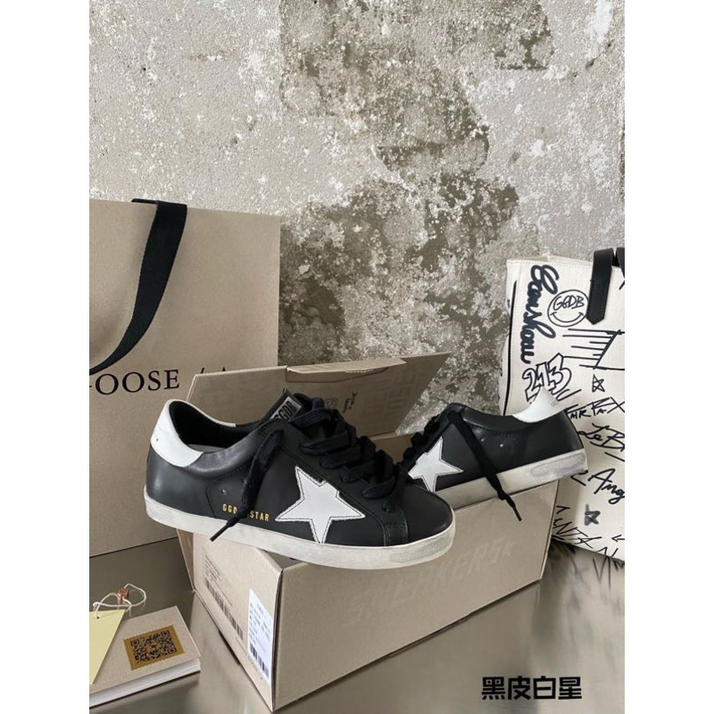 golden goose black S*per-star sneakers in leather with white star
