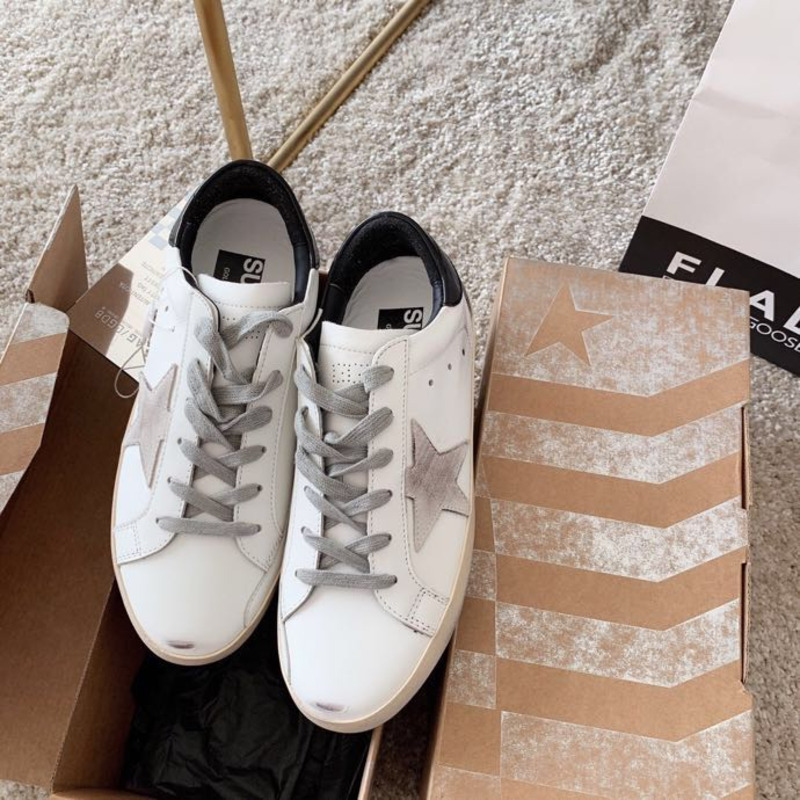 golden goose men’s S*per-star sneakers with suede star and black heel tab