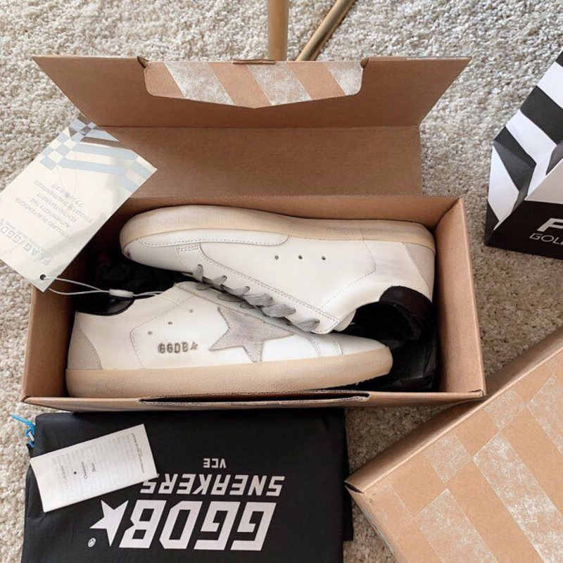 golden goose men’s S*per-star sneakers with suede star and black heel tab