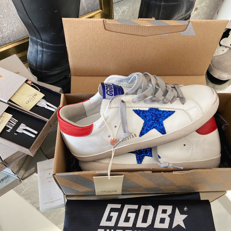 golden goose S*per-star sneakers with blue glitter and red heel tab