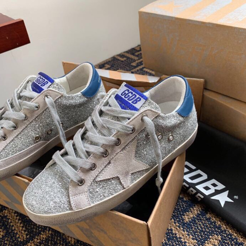 golden goose S*per-star sneakers with sliver glitter and blue heel tab