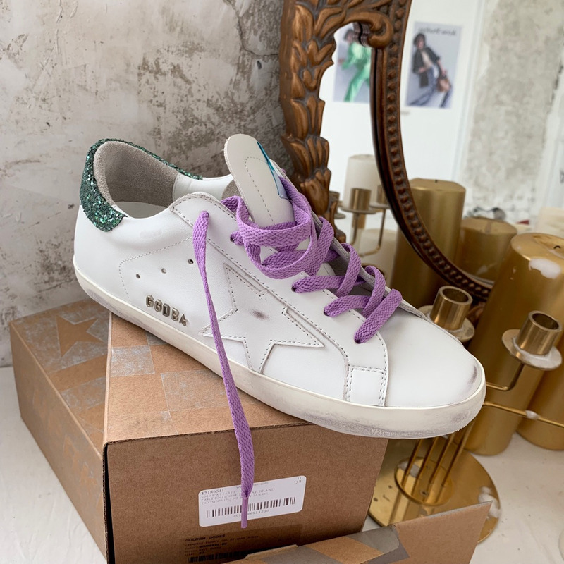 golden goose S*per-star sneakers with star and green glitter heel tab