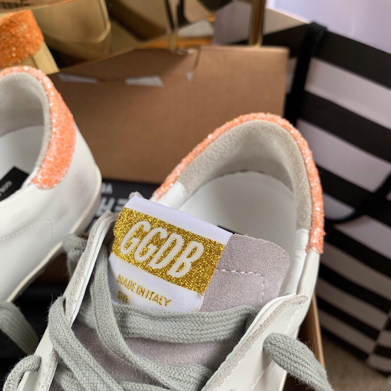 golden goose S*per-star sneakers with sliver glitter and orange heel tab