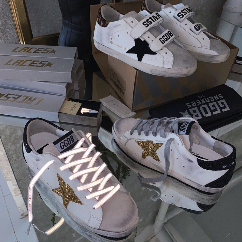 golden goose men’s S*per-star sneakers with golden glitter and black heel tab
