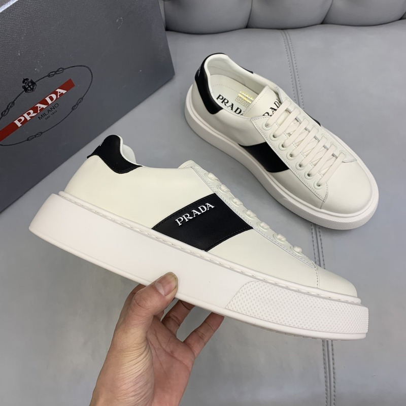 Pra*a unisex plain leather logo low-top sneakers black