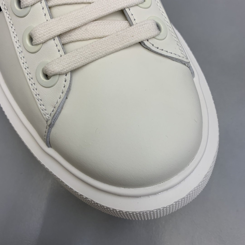 Pra*a unisex plain leather logo low-top sneakers black