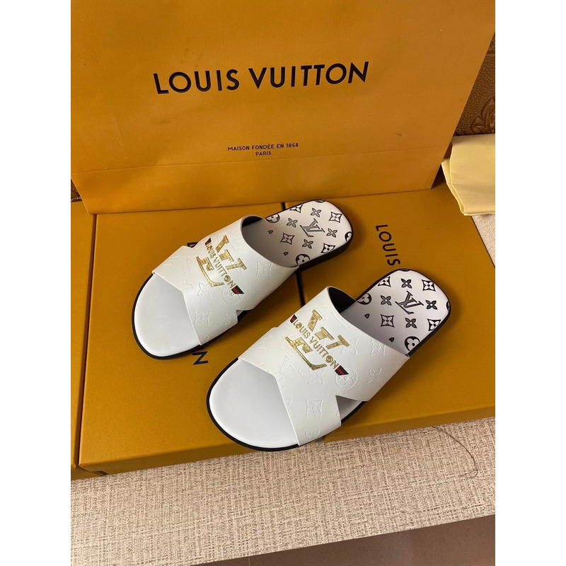 l**is V*t*n gold logo mules white