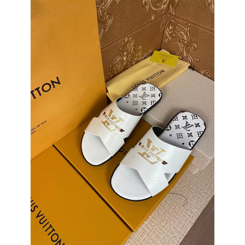 l**is V*t*n gold logo mules white