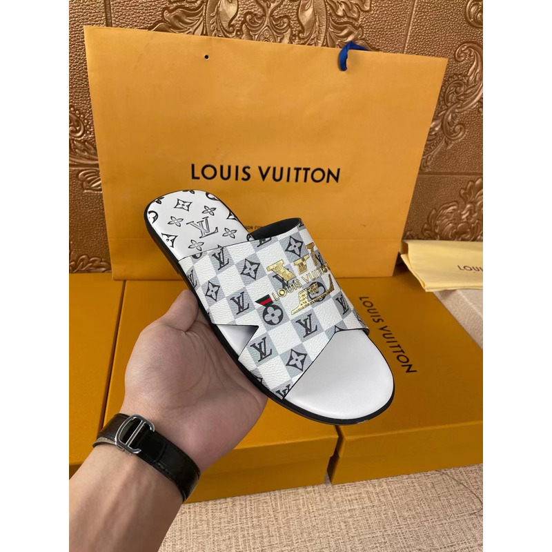 l**is V*t*n gold logo monogram mules white