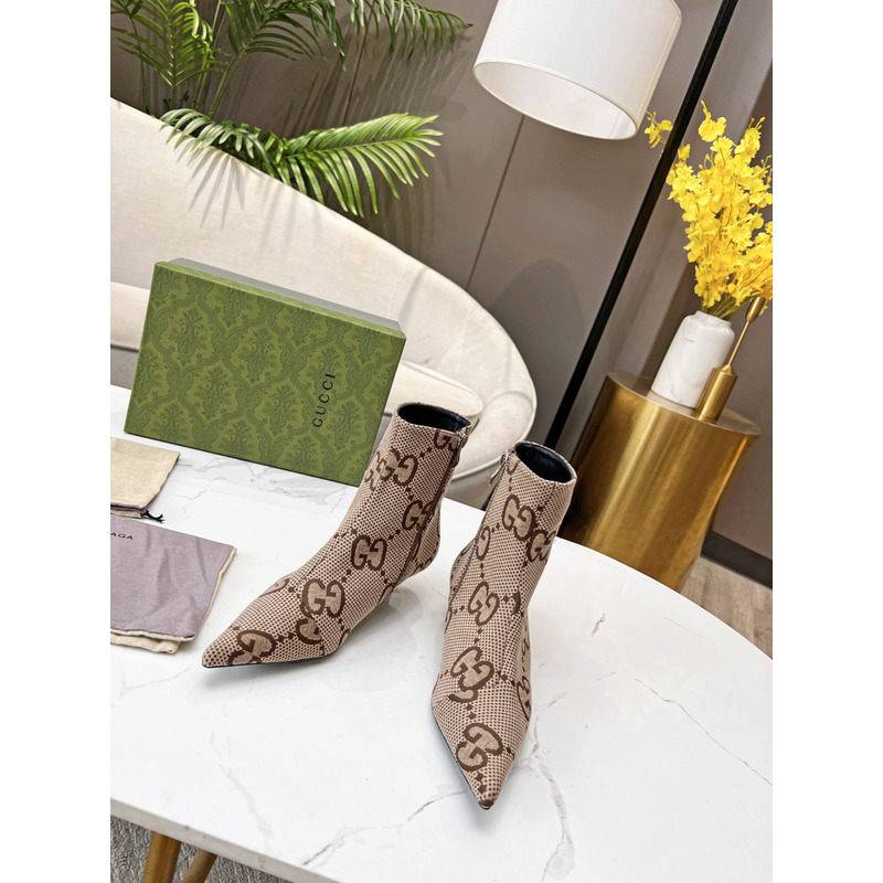 g*u*i x Ba*len*cia*ga collaboration ankle boots in brown