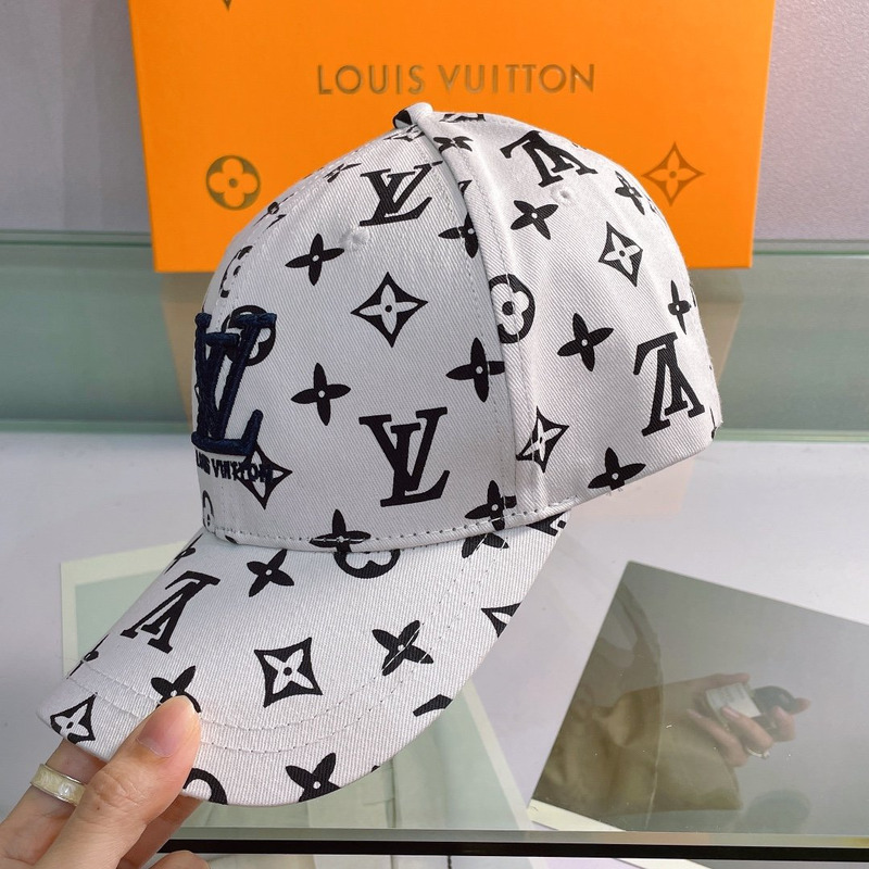 l**is V*t*n embroidered logo hat white