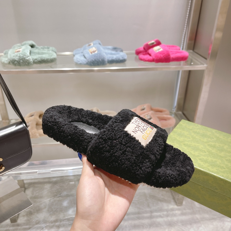 g*u*i x the n0*h F**e shearling slides black