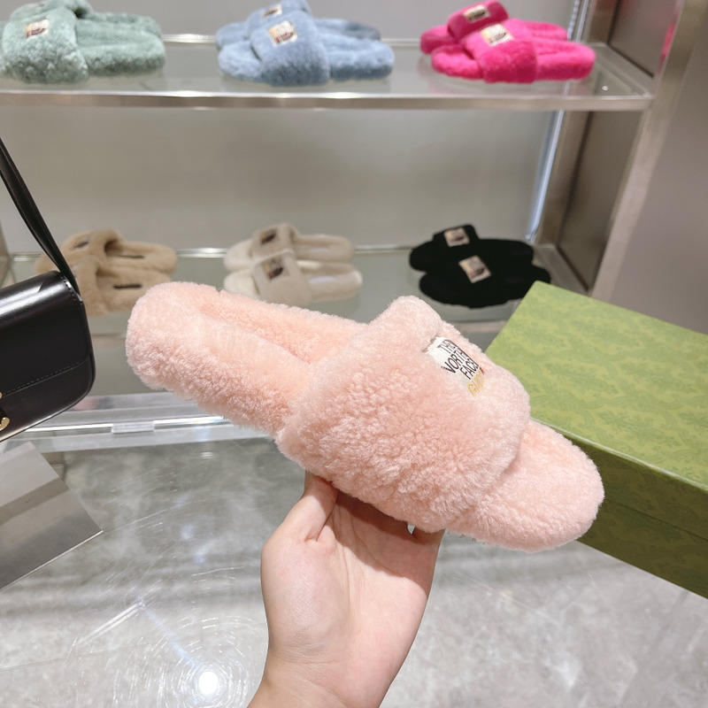 g*u*i x the n0*h F**e shearling slides light pink