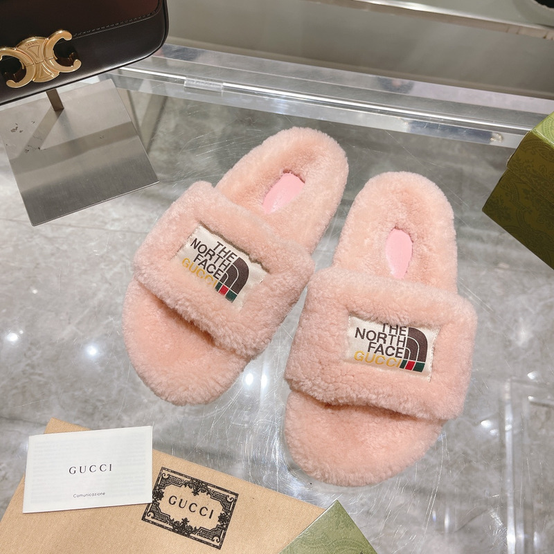 g*u*i x the n0*h F**e shearling slides light pink