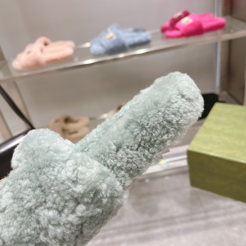 g*u*i x the n0*h F**e shearling slides green