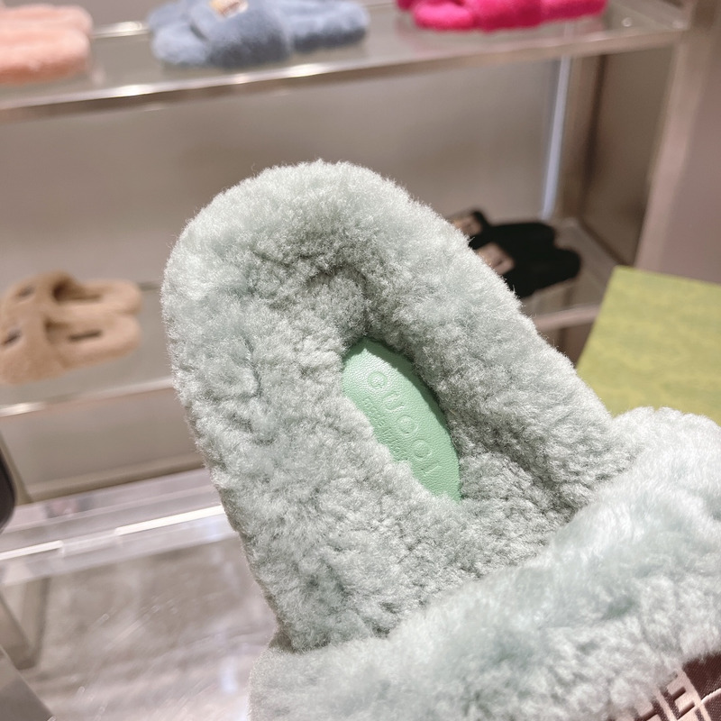 g*u*i x the n0*h F**e shearling slides green