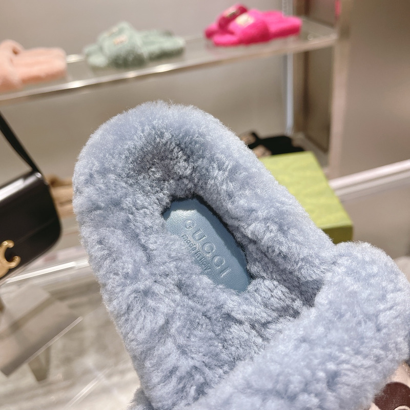g*u*i x the n0*h F**e shearling slides blue