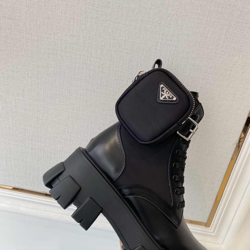 Pra*a monolith glossed leather and nylon short boots black