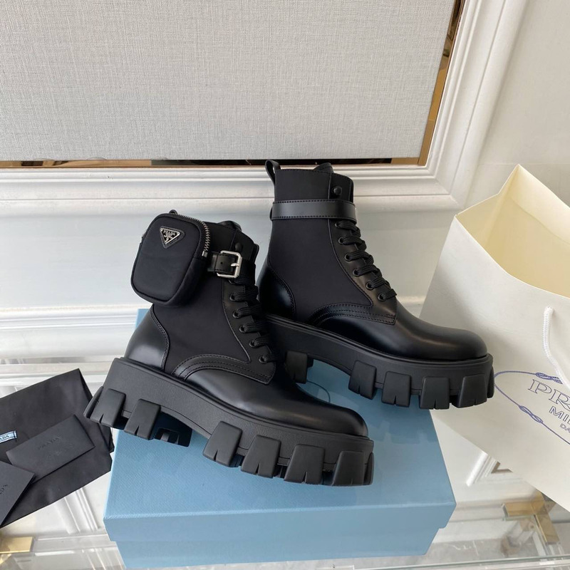 Pra*a monolith glossed leather and nylon short boots black