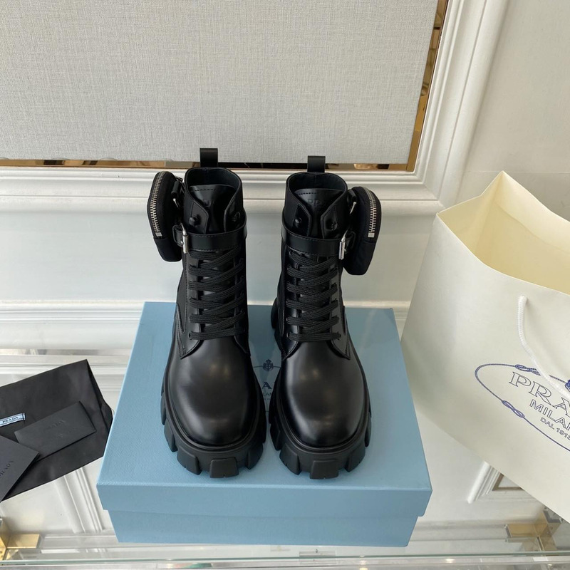Pra*a monolith glossed leather and nylon short boots black