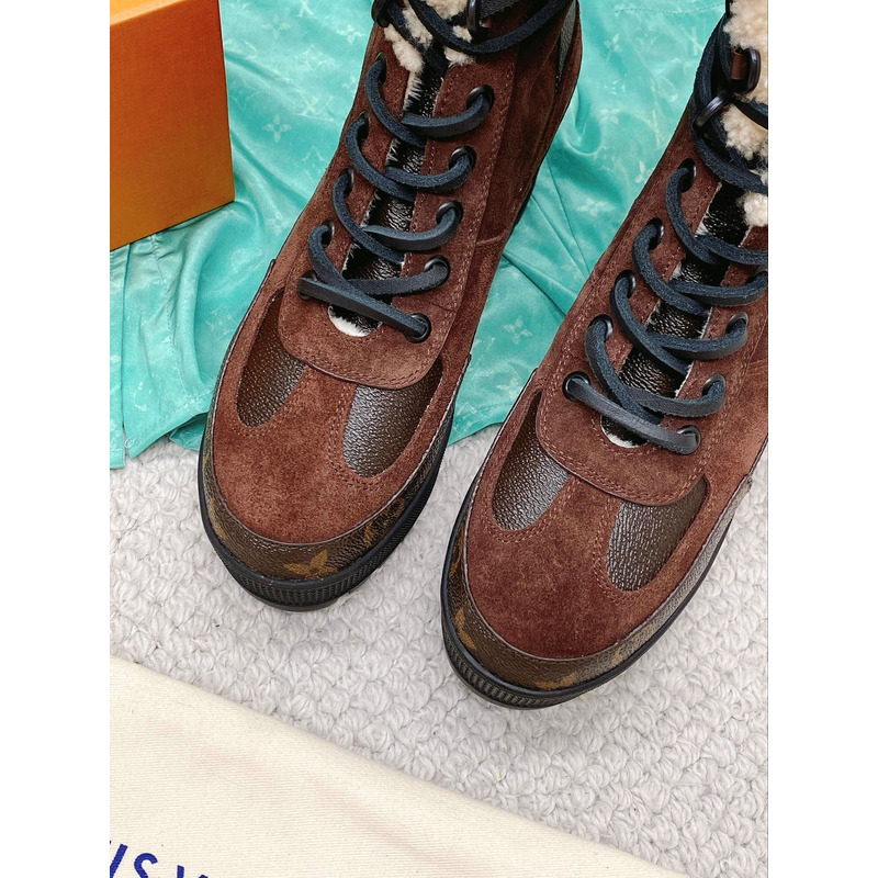 l**is V*t*n laureate monogram platform boots brown