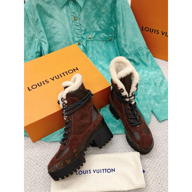 l**is V*t*n laureate monogram platform boots brown