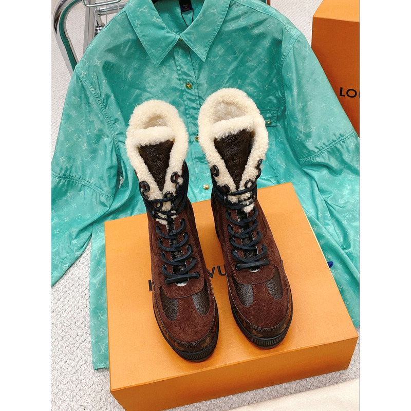 l**is V*t*n laureate monogram platform boots brown