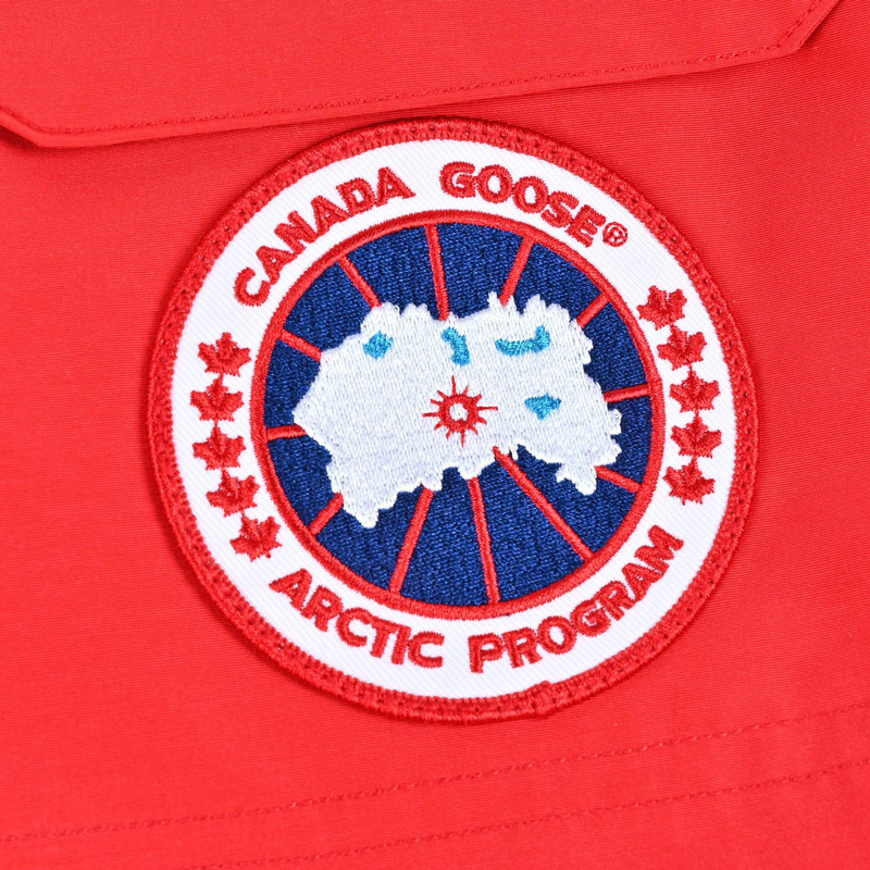 Can*a Go*e expedition parka in red