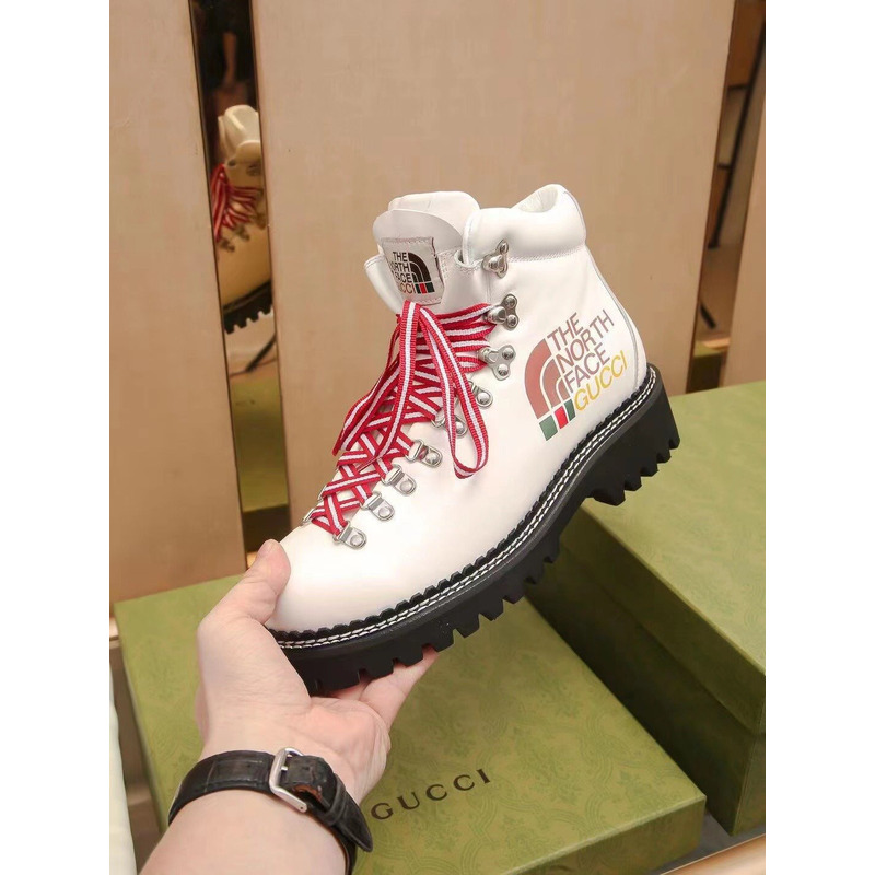 g*u*i x the n0*h F**e leather ankle boots white