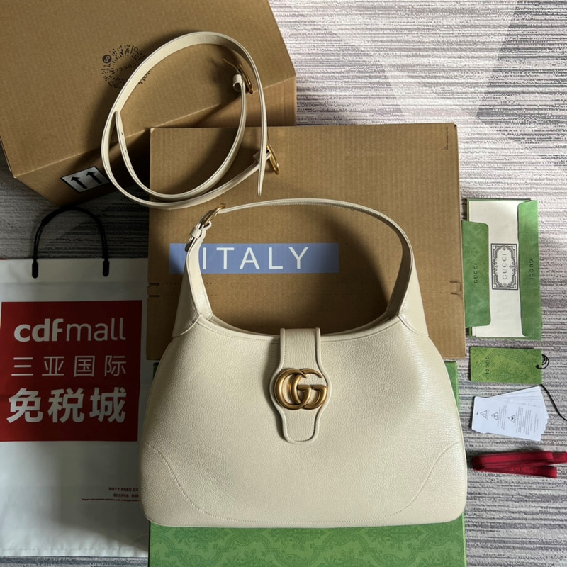G*u*i aphrodite medium crescent shoulder bag white