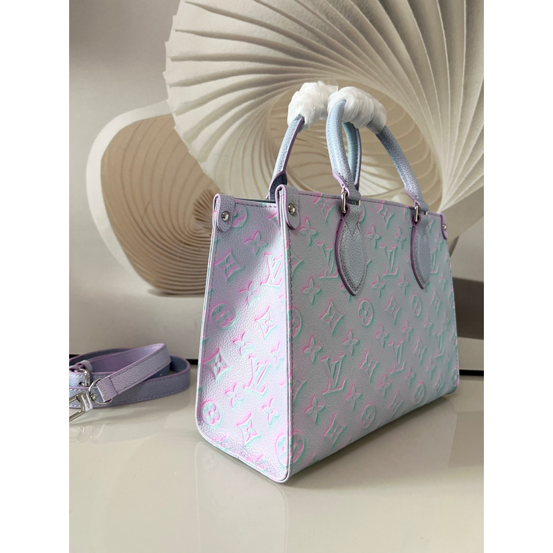 l**is V*t*n  green, and blue summer stardust onthego pm silver hardware