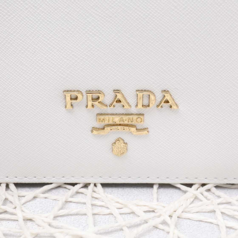 Pra*a saffiano leather mini bag white